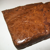 Picture of large, square, chocolate brownie.